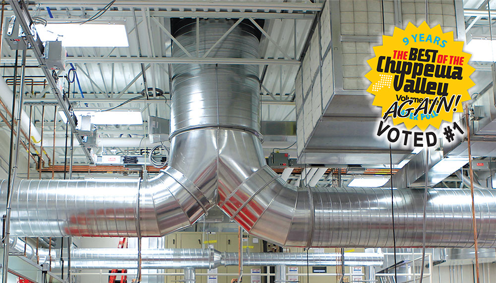 photo of large aluminum ducting installed at large industrial plant