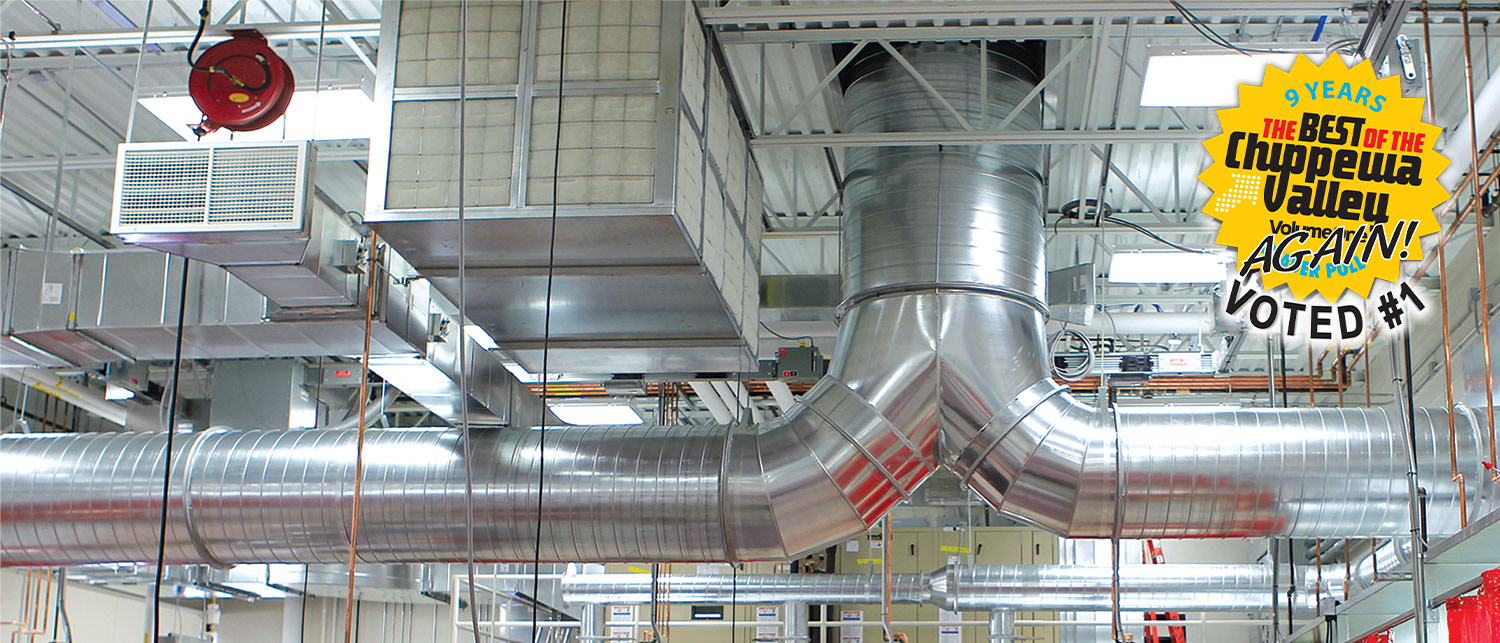 photo of large aluminum ducting installed at large industrial plant