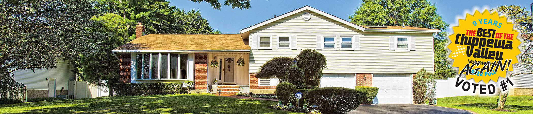 photo of nice residential home on sunny day